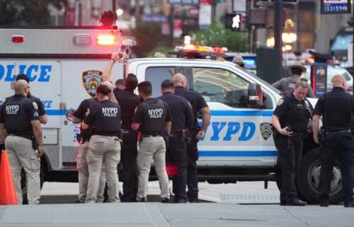 Police respond to an incident in midtown Manhattan on July 28.