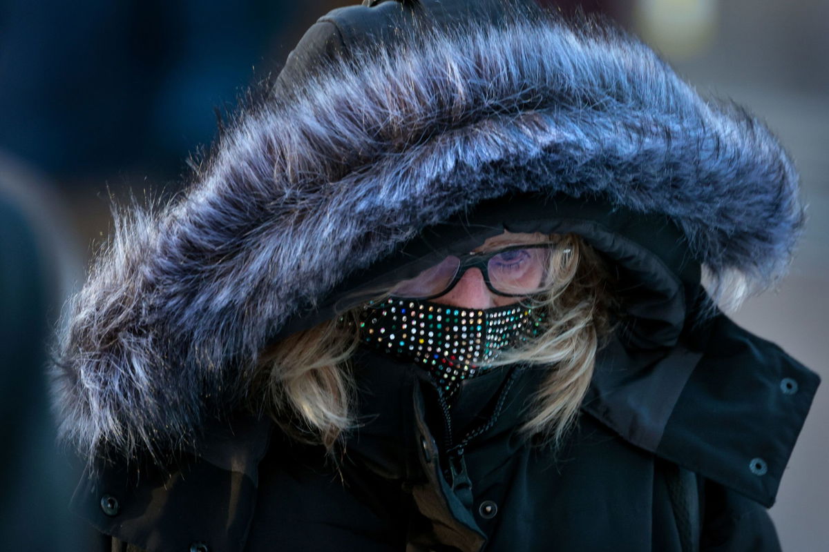 A commuter is seen bundled for the cold in Boston last January.