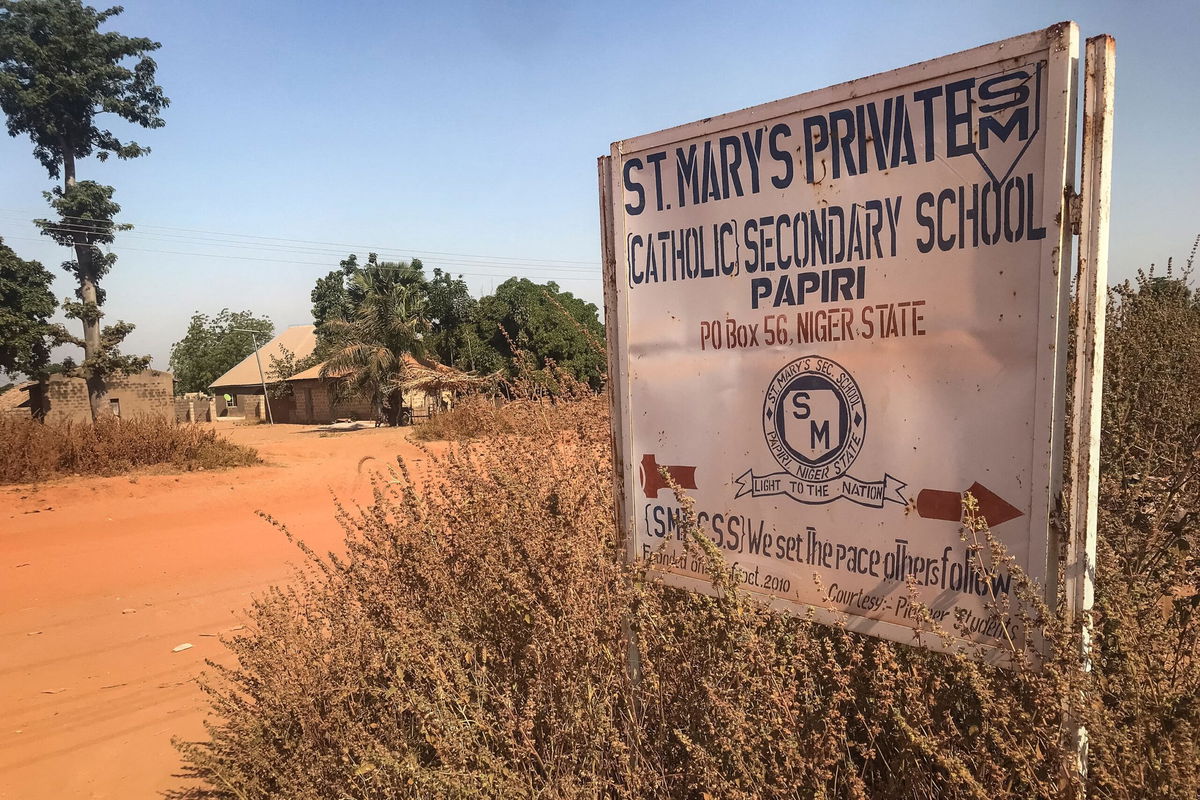 A signboard for St. Mary's Private Catholic School stands at the entrance of the school in Papiri