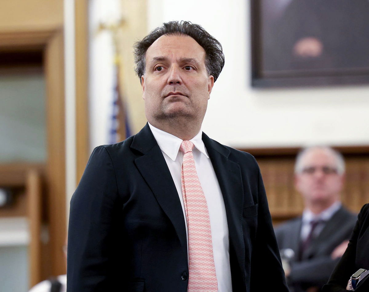 Investigators gather at the home of missing Cohasset