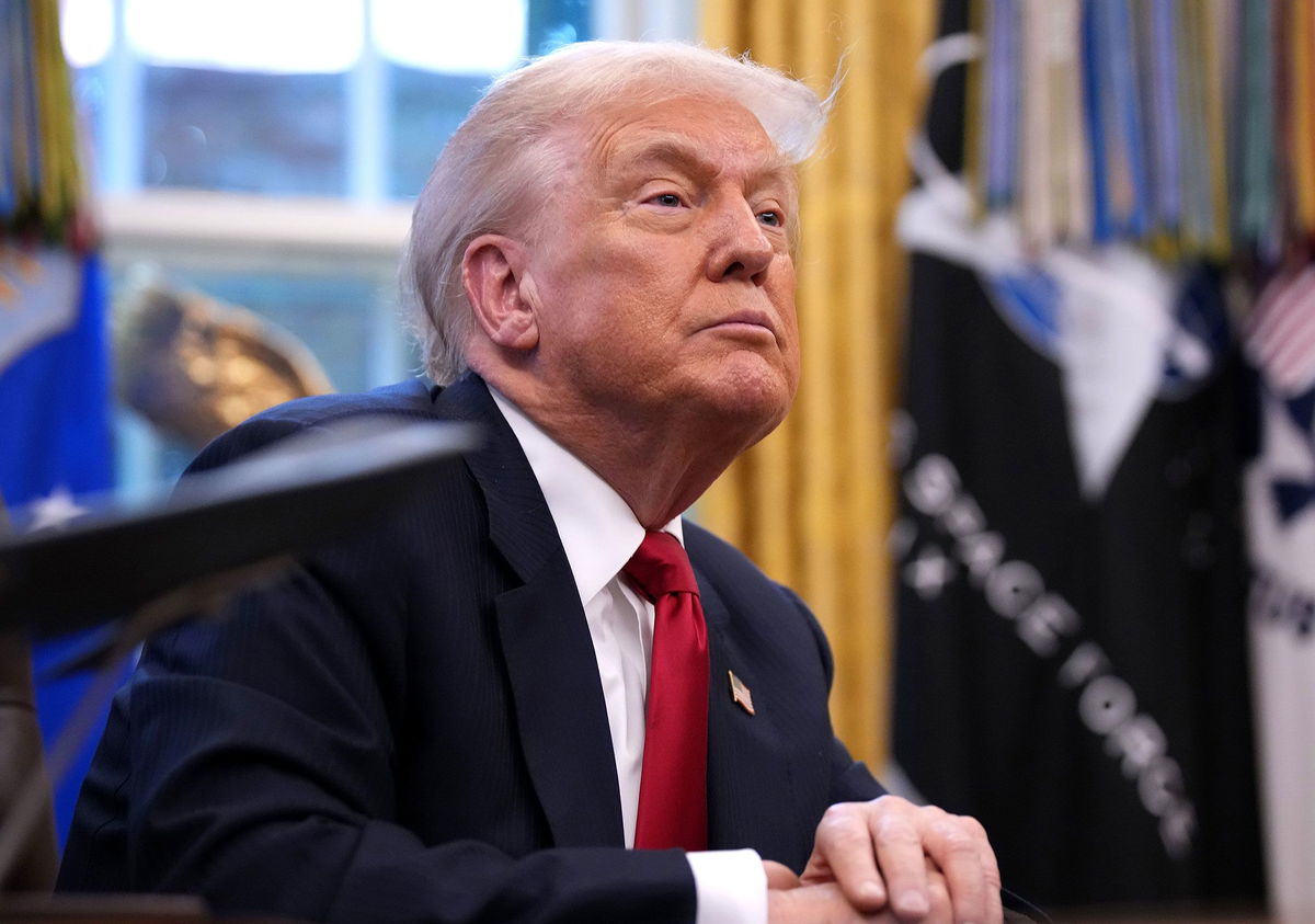 President Donald Trump delivers remarks in the Oval Office of the White House on November 21