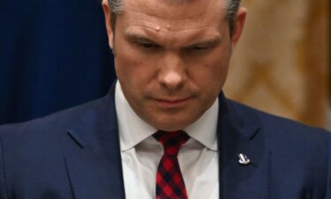 Secretary of Defense Pete Hegseth listens as President Donald Trump speaks during a Cabinet meeting at the White House